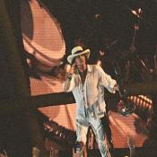 Steven Tyler of Aerosmith shows the crowd how to have a good time.