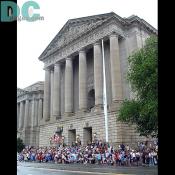 A crowd gathers in anticipation of the parade.