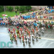 A colorful marching band parades down Constitution Avenue.