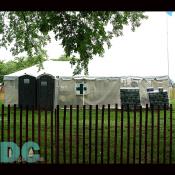 A First Aid Tent in case of medical emergencies.  The most common ailment being dehydation, hence the stacks of bottled water.