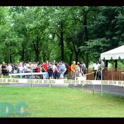 The long line at this security checkpoint went down the street.  All people who were trying to get seats on the lawn needed to be checked.