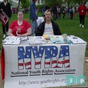 Two NYRA (National Youth Rights Association) activists pass out literature explaing how to protect and defend the civil and human rights of young people in the United States. 