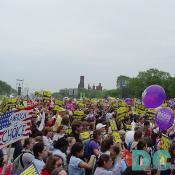 Women, Men and Children filled the National Mall from the Washington Monument to the U.S. Capitol in support of Reproductive Rights.  This group of supporters from NARAL hold signs which read WHO DECIDES? and ITS YOUR CHOICE ... NOT THEIRS.  One activist holds a hand-made sign stating the AMERICA IS CHOICE within a U.S. Flag.