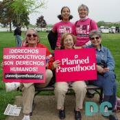 Generations of women from Planned Parenthood STAND UP FOR CHOICE and hold a sign that reads DERECHOS REPRODUCTIVOS SON DERECHOS HUMANOS (Reproductive Rights are Human Rights)