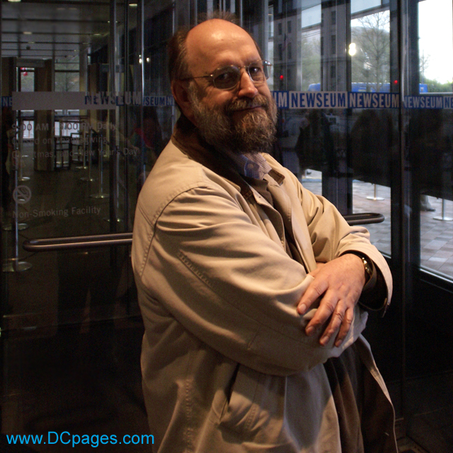 First person in line waiting for the Newseum to open its glass doors.