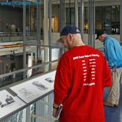 Visitor Laughing at Past Political Humor