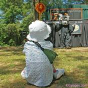 Litttle Girl is Mesmerized by Puppet Show
