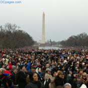 Adherents of newly elected President Obama applaude his speech