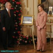 "This year it's a beautiful oil painting of the Oval Office, with the lights on in the Oval Office for -- this card goes out, a lot of people have already mentioned that they've gotten their cards, so we're probably one of the first American families in the month to get our cards already out. (Laughter.) So I hope if you all are on our list that you've already gotten yours." - Remarks of Mrs. Laura Bush