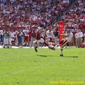 Derrick Frost (4) punt blocked by Matt Ware (22). 