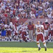 Kurt Warner (13) pass short left to 45-T.Smith pushed ob at WAS 40 for 9 yards (52-R.McIntosh). 