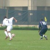 #7, Ricky Schramm of Georgetown, races to the ball in an effort to beat Howard's Famara Cham.