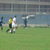 As Howard forwards bring the ball up the field, the Hoyas defense scrambles to stop them.