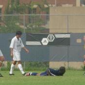 Red Card!! A Howard player goes down and the referee awards Howard a free kick because of the foul.