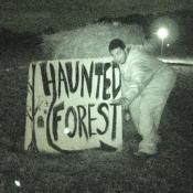 An evil goblin guards the Haunted Forest. 
