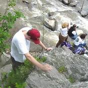 To get better shots of the competition we had to climb down the perilous rocks.