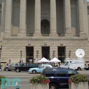Mellon Auditorium is the central focus of a tripartite building group occupying the two block area between 12th and 14th Streets on Constitution Avenue, in the Northwest quadrant of Washington DC.