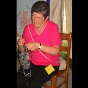 Cute little Scottish woman knitting away!