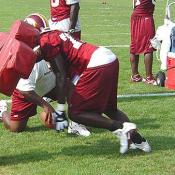 DE Bruce Smith shows how one of the greatest to ever play hits the pads.