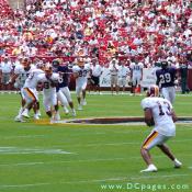 Number 13 returns the kickoff.