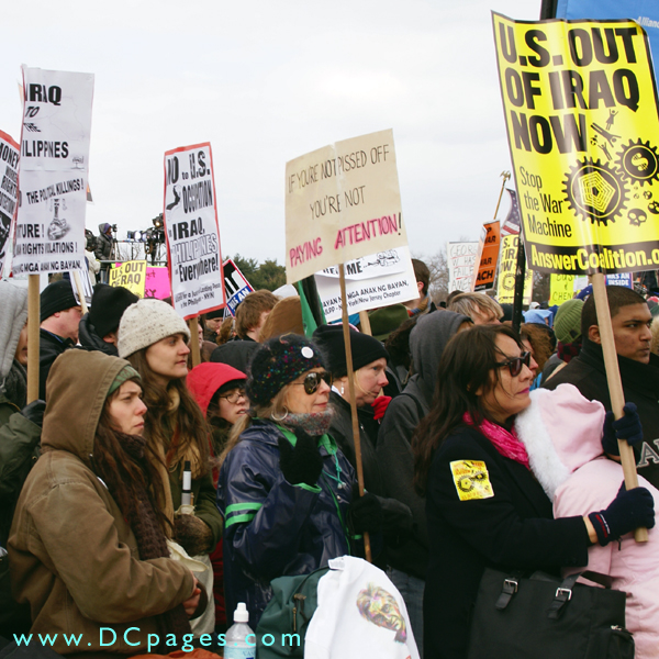 Crowd of protesters look on as Brian Beck addresses them.