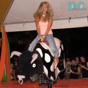hot blonde girl riding mechanical bull