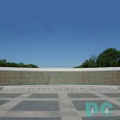 West to East View of the World War II Memorial. 4,000 sculpted gold stars commemorate the more than 400,000 Americans who died in the war. HERE WE MARK THE PRICE OF FREEDOM is incribed in granite stone.