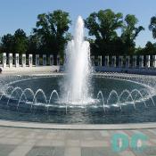 Southeast to Northwest view of the Rainbow Pool: 246'-9" long; 147'-8" wide.  Bronze wreaths with armatures (2 wreaths on each pillar, one on each side) are in the background.