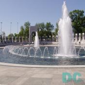 South to North view. Rainbow Pool: 246'-9" long; 147'-8" wide. "Academy Black" and "Mount Airy" masoned granite were selected to reconstruct the Rainbow Pool. "Mount Airy," granite quarried in North Carolina, is the original coping stone of the Rainbow Pool. To enhance the aesthetic appearance of the water surface of the pool, an apron of "Academy Black," granite quarried in California, was be used for the vertical interior surfaces.