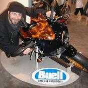 Wow, this guy is good on that brand new Buell Firebolt XB9R. Whats interesting about this bike is that it's aluminum frame holds fuel, a gigantic single disc brake rotor, a belt-drive instead of chain, and it's american. 