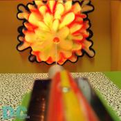 A game of who hits the water target most accurately wins a prize.