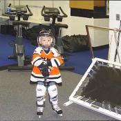 John Gruden's son stops by on his way out to the ice.