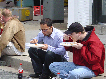 People relaxed on the otherwise crowded streets of Bethesda to enjoy some food.