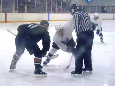 Jeff Halpern and Michael Nylander face-off against each other.
