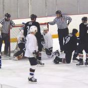 A little commotion in front of the net.