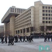 Soldiers walking in front the Hoover Building