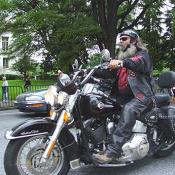 He has a Tea cup helmet so that he can feel the wind through his beard.