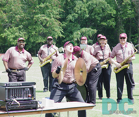 Symbolman Steve Richards is in his third season with the band.  Richards, from Centerville, Virginia, said "It's a great thrill and I certainly try to put a litle enthusiaism in my playing."  The showstoper got the fans pumped up for Coach Gibbs.