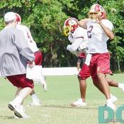 QB Gibran Hamdan throws a pass against the rush.