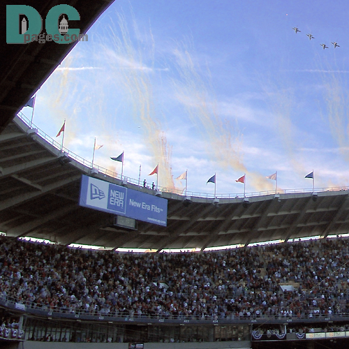 Washington Nationals' Inaugural Home Opener - Four Airforce fighter planes fly over RFK during the National Anthem.