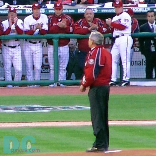 Washington Nationals' Inaugural Home Opener - The crowd goes silent as the  the commander-in-chief steps on the pitcher's mound.