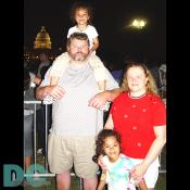 Its Michael Moore!...no its just his look alike with his family to pay their respects.