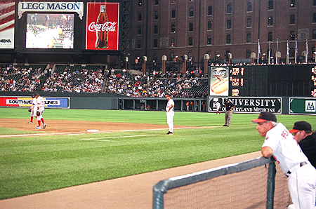 Orioles bench coach Sam Perlozzo watches his team play.