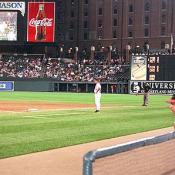Orioles bench coach Sam Perlozzo watches his team play.