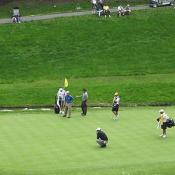 Down at the hole, watching this Pro plan his shot