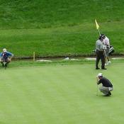 A Pro getting down low to make sure of his next shot