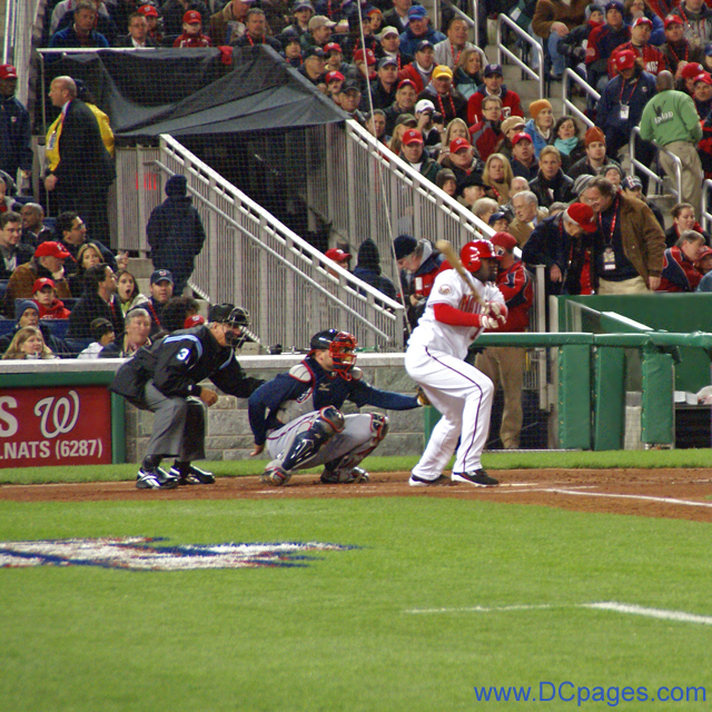 Swing and a hit, Cristian Guzman makes contact with the pitch.