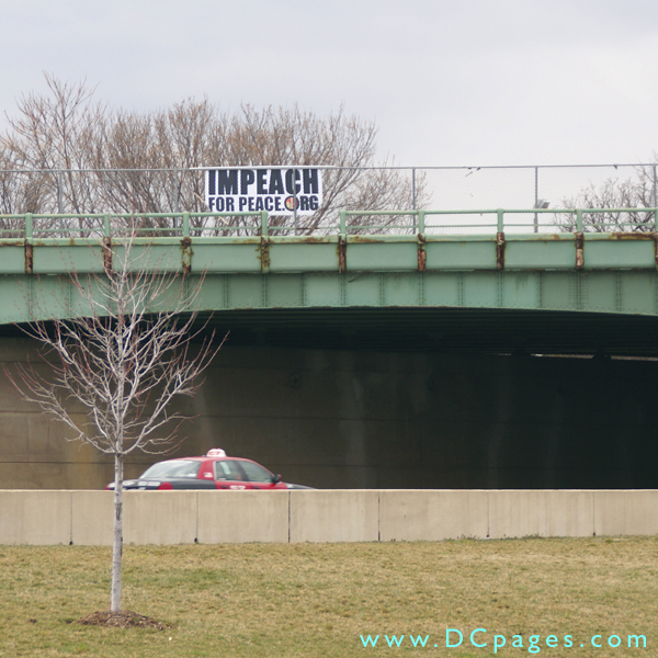 Sign above Pentagon bridge - IMPEACHFOREPEACE.ORG