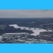 View of the Kennedy Center (foreground), Key Bridge, and the the Potomac River taken from observation floor of the Washington Monument.