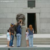 Family Rubbing Lincoln's Nose